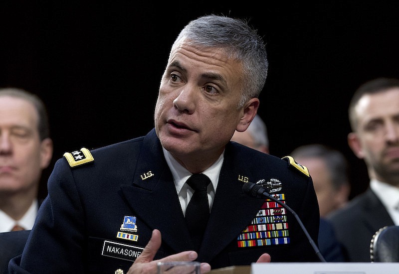 In this Jan. 29, 2019, file photo National Security Agency Director Gen. Paul Nakasone testifies before the Senate Intelligence Committee on Capitol Hill in Washington. Nakasone, the commander of U.S. Cyber Command and the director of the National Security Agency, says in a piece being published Tuesday, Aug. 24, 2020, by the magazine Foreign Affairs that the military's cyber fighters are increasingly prepared to engage in combat with online adversaries rather than wait to repair networks after they've been penetrated. (AP Photo/Jose Luis Magana, File)