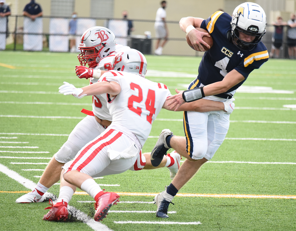Staff Photo by Matt Hamilton / Chattanooga Christian (4) Sam Hall stays in bounds and makes a move on Baylor (24) Gaston Carmichael. The Chattanooga Christian School Chargers hosted the Baylor School Red Raiders Friday.