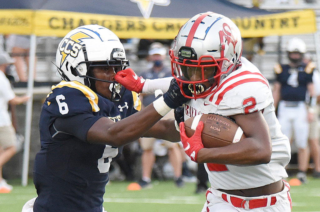 Staff Photo by Matt Hamilton / Chattanooga Christian (6) Boo Carter tries to bring down Baylor (2) Elijah Howard. The Chattanooga Christian School Chargers hosted the Baylor School Red Raiders Friday.