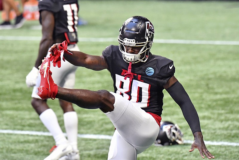 AP photo by Hyosub Shin / Wide receiver Laquon Treadwell warms up for a scrimmage during the Atlanta Falcons' training camp Thursday in Flowery Branch, Ga. Treadwell was among the players Atlanta cut to get their roster down to 53 for the season opener.