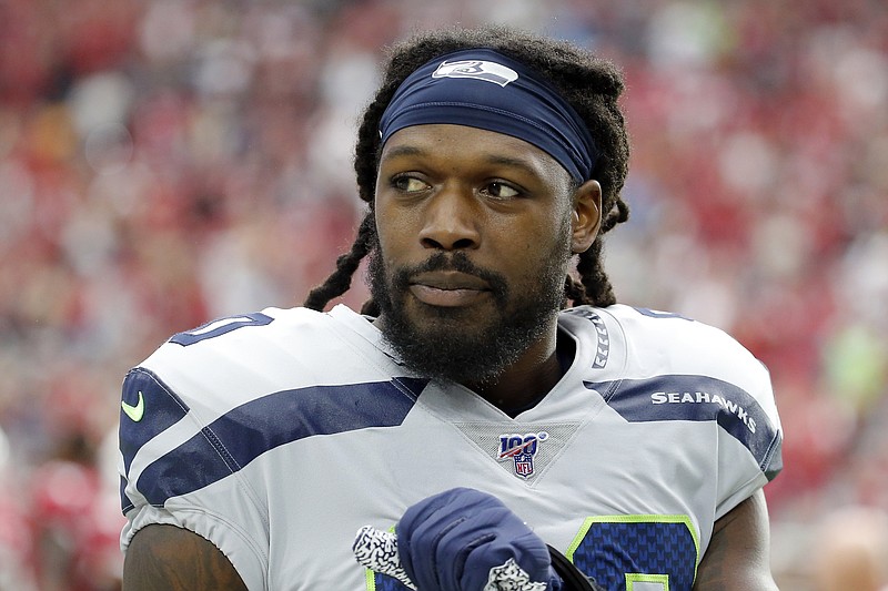 AP file photo by Rick Scuteri / Jadeveon Clowney, a defensive end/outside linebacker who played last season for the Seattle Seahawks, has agreed to terms with the Tennessee Titans on a one-year contract, the team announced Sunday.