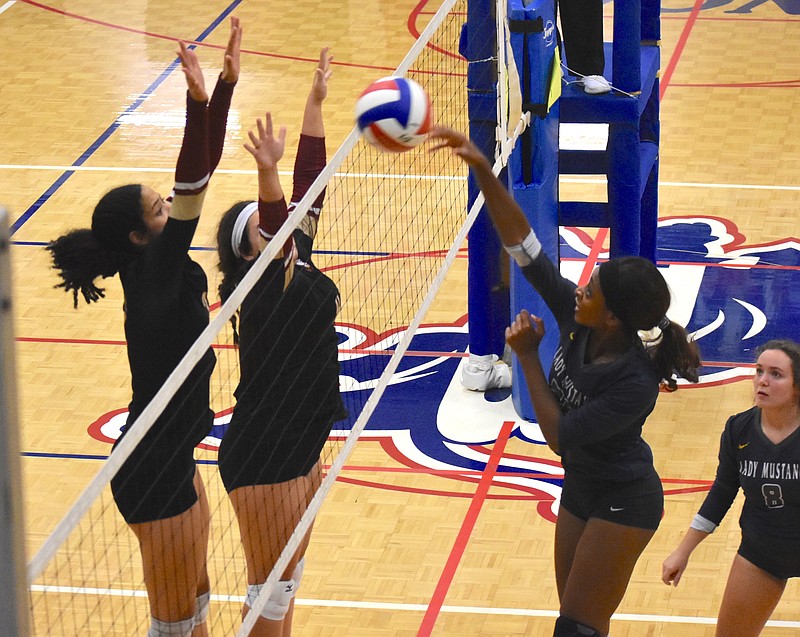 Staff photo by Patrick MacCoon / Walker Valley's Jia Weathersby, right, took over at times during Saturday's Choo Choo Classic championship match against Hebron Christian at Red Bank High School. The Lady Mustangs lost the best-of-three gold bracket final 2-1.