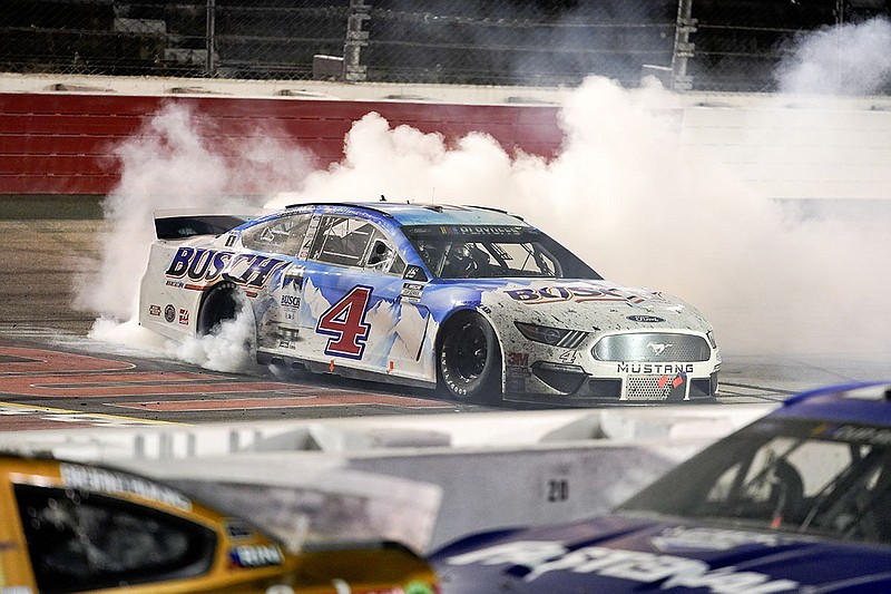 AP photo by Chris Carlson / NASCAR driver Kevin Harvick celebrates after winning the Southern 500, the Cup Series playoff opener, on Sunday night at South Carolina's Darlington Raceway.