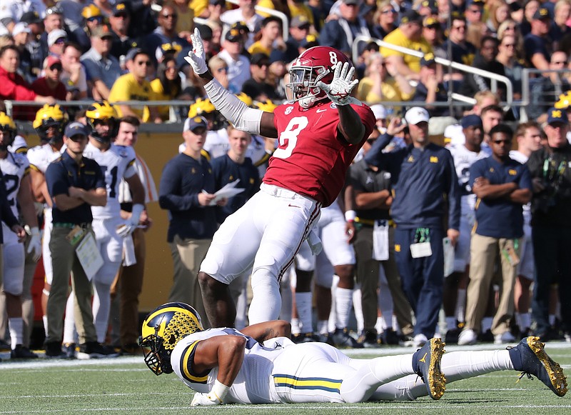 Crimson Tide photos / Alabama inside linebacker Christian Harris celebrates a stop during January's 35-16 thumping of Michigan in the Citrus Bowl.