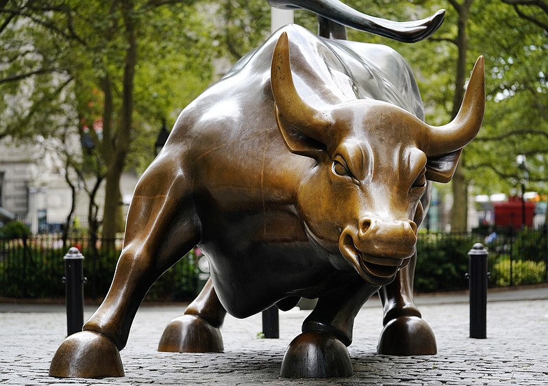 The Charging Bull statue is shown in New York's financial district, Tuesday, Sept. 8, 2020. More sharp declines for big tech stocks are dragging Wall Street toward a third straight loss on Tuesday. (AP Photo/Mark Lennihan)