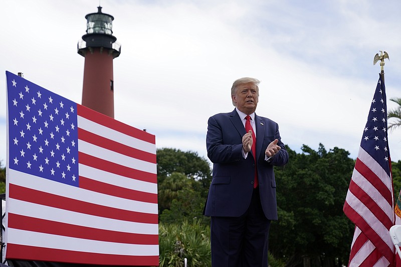 President Donald Trump arrives to speak on the environment at the Jupiter Inlet Lighthouse and Museum, Tuesday, Sept. 8, 2020, in Jupiter, Fla. (AP Photo/Evan Vucci)
