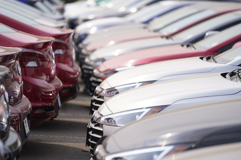 A long line of unsold 2020 Elantra sedans sits at a Hyundai dealership Sunday, Aug. 23, 2020, in Littleton, Colo. (AP Photo/David Zalubowski)