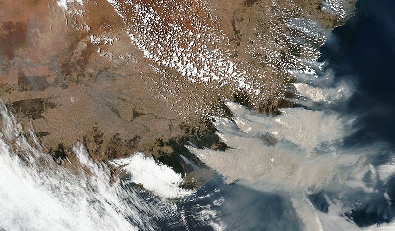 FILE - This satellite image provided by NASA on Saturday, Jan. 4, 2020 shows smoke from wildfires in Victoria and New South Wales, Australia. A hotter world is getting closer to passing a temperature limit set by global leaders five years ago and may exceed it in the next decade or so, according to a new United Nations report released on Wednesday, Sept. 9, 2020. (NASA via AP)


