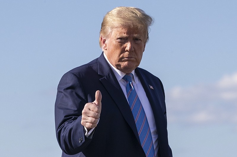 FILE - In this Sunday, June 14, 2020 file photo, President Donald Trump gives a thumbs-up while walking across the tarmac as he boards Air Force One at Morristown Municipal Airport, in Morristown, N.J. Trump is returning to Washington. A far-right Norwegian lawmaker says he has nominated President Donald Trump for the Nobel Prize 2021 for his efforts to reach a peace agreement in the Middle East. Christian Tybring-Gjedde, a member of the Norwegian Parliament for the far-right Progress Party, said on Wednesday, Sept. 9, 2020 that Trump should be considered for his work "for reaching a peace agreement between the United Arab Emirates and Israel which opens up for possible peace in the Middle East. (AP Photo/Alex Brandon, File)


