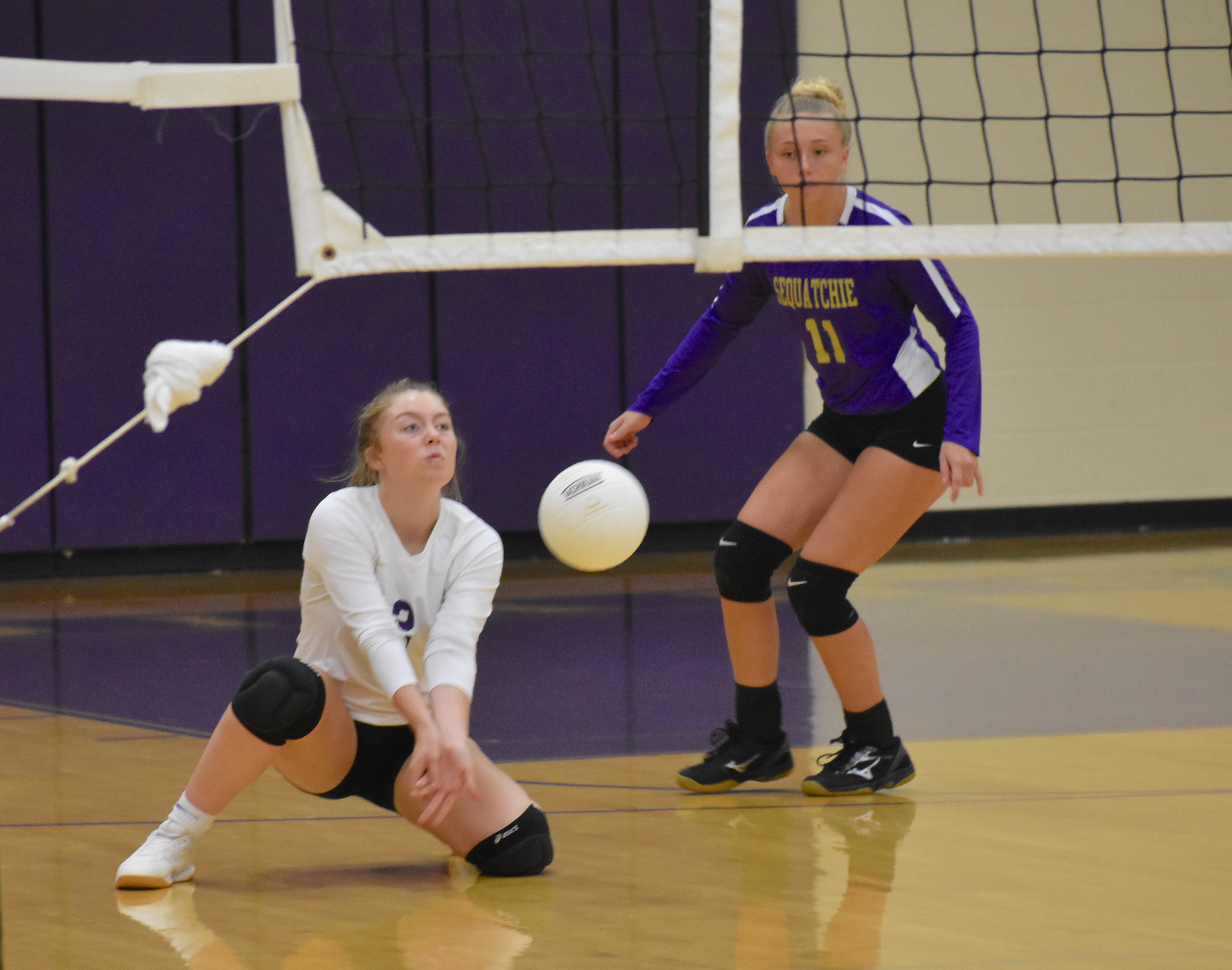 Staff photo by Patrick MacCoon / Sequatchie County's Megan Hall digs the ball during a home victory over Red Bank on Thursday.