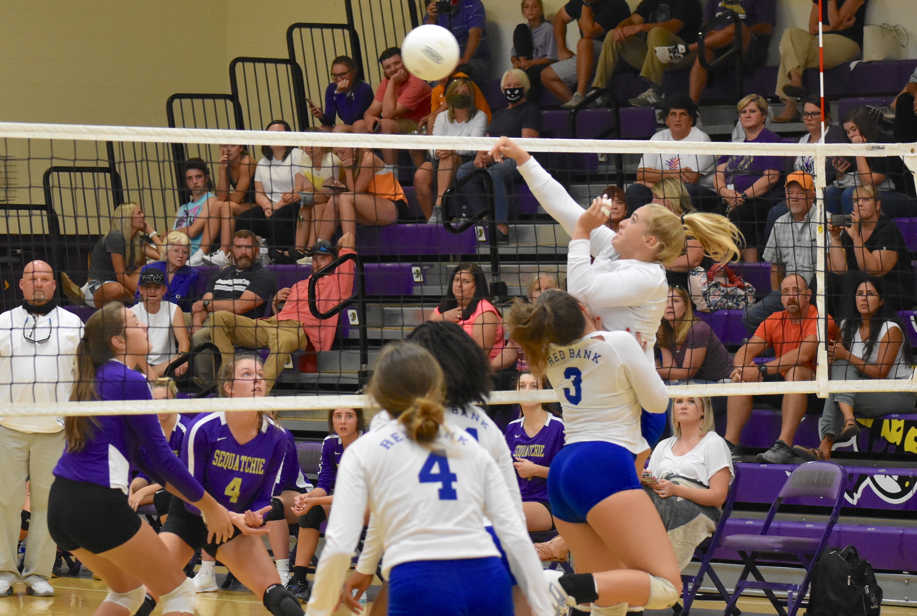 Staff photo by Patrick MacCoon / Red Bank's Bailee Phillips hits at the net during Thursday's district match at Sequatchie County.