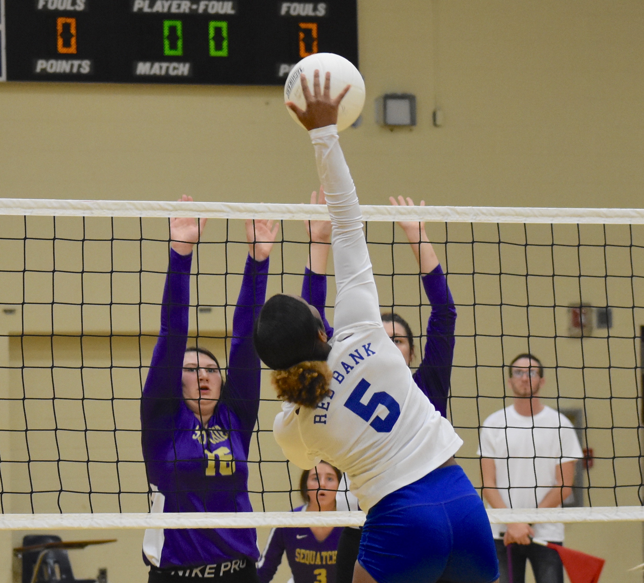 Staff photo by Patrick MacCoon / Red Bank's Arreyanna Glass hits the ball against Sequatchie County defenders.