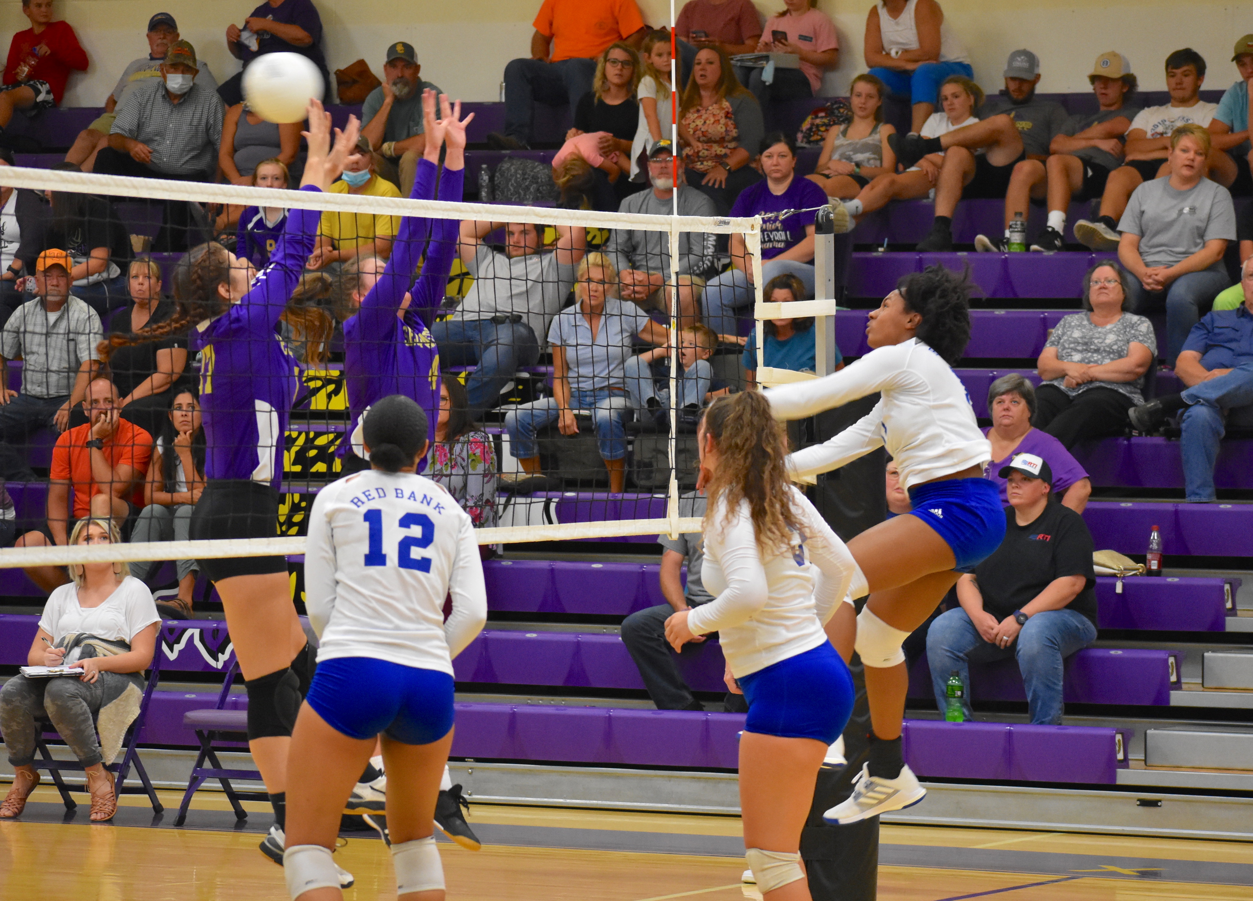 Staff photo by Patrick MacCoon / Red Bank's Ashley Ware delivers a powerful hit on the right sideline during Thursday's road match at Sequatchie County.