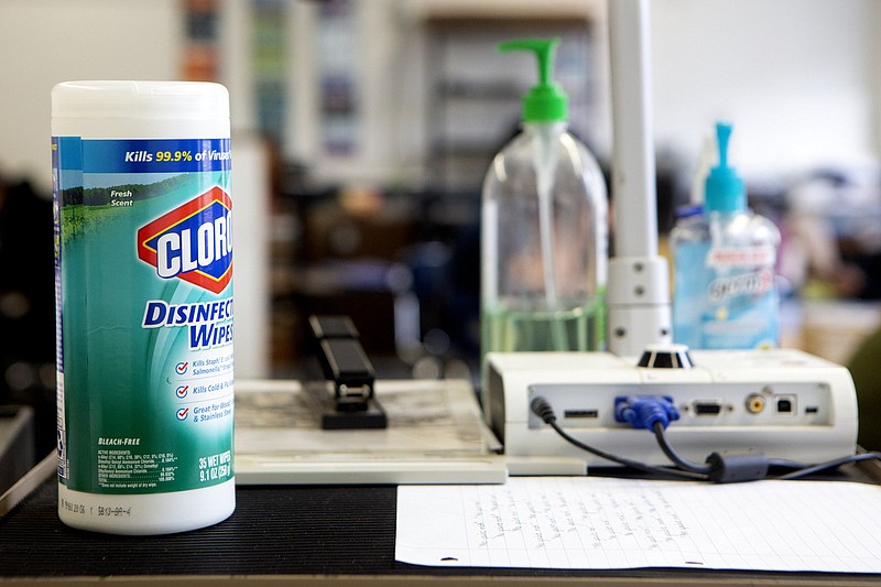 Staff photo by C.B. Schmelter / Disinfectant wipes and hand sanitizers are seen in Brandon Lowry's classroom at Chattanooga School for the Arts and Sciences on Wednesday, March 11, 2020 in Chattanooga, Tenn.