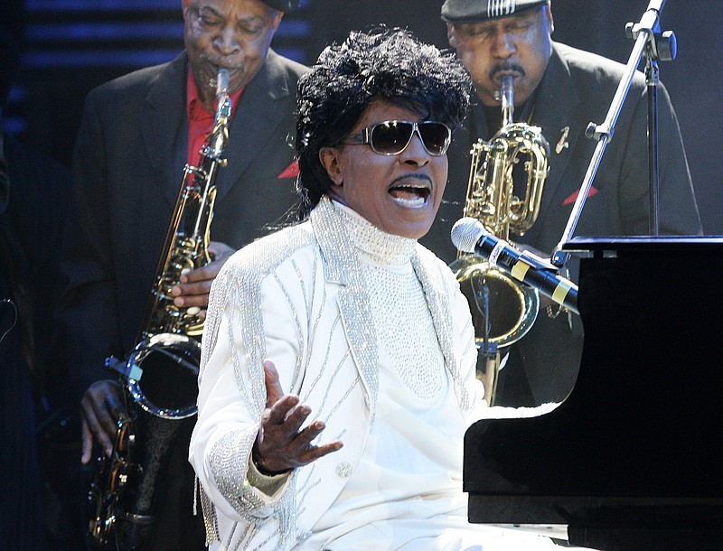  In this May 30, 2009 file photo, Little Richard performs at The Domino Effect, a tribute concert to New Orleans rock and roll musician Fats Domino, at the New Orleans Arena in New Orleans. ESPN is changing their "Monday Night Football" theme song. The season will feature a new version of Little Richard's hit "Rip It Up," featuring new instrumentals and backup vocals from the Virginia-based band Butcher Brown. Hank Williams Jr. had sung the theme song for years in a version of his hit "All My Rowdy Friends Are Coming Over Tonight." (AP Photo/Patrick Semansky, File)