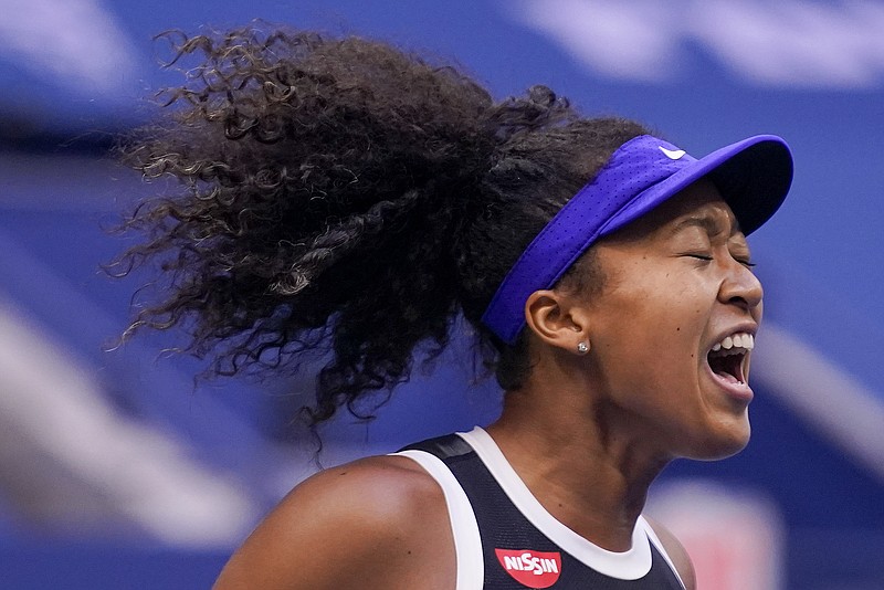 AP photo by Seth Wenig / Naomi Osaka reacts during the U.S. Open women's singles final against Victoria Azarenka on Saturday in New York.