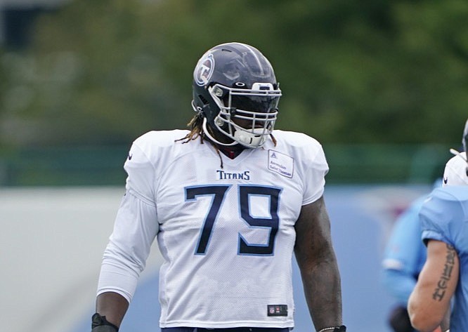 Tennessee Titans offensive tackle Isaiah Wilson gets set to run a drill during NFL football training camp Friday, Aug. 28, 2020, in Nashville, Tenn. (AP Photo/Mark Humphrey, Pool)


