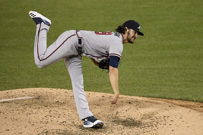 AP photo by Nick Wass / Atlanta Braves rookie starter Ian Anderson follows through on a pitch during the fifth inning of Saturday night's game against the host Washington Nationals.