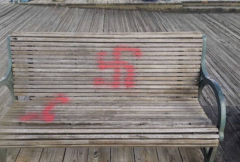 Spray painted symbols on or near the Walnut Street Bridge Sunday, Sept. 13, 2020. Staff photo/ Sarah Grace Taylor