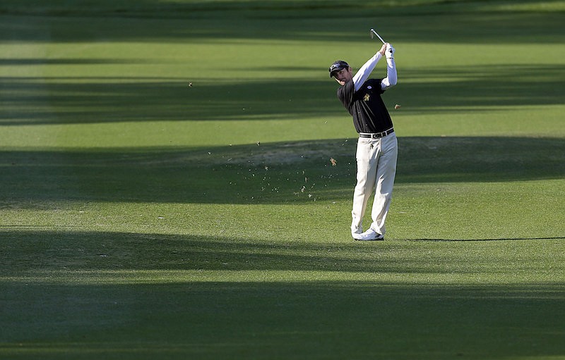 In this March 14, 2013, file photo, Andy Pope hits from the shadows on the fifth fairway during the first round of the Tampa Bay Championship golf tournament in Palm Harbor, Fla. Pope was among those unable to qualify for the U.S. Open this year because the COVID-19 pandemic led to an all-exempt field for Winged Foot. (AP Photo/Chris O'Meara, File)