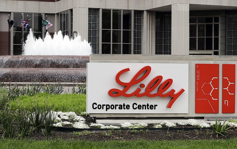 The Eli Lilly corporate headquarters is pictured April 26, 2017, in Indianapolis. A drug company says that adding an anti-inflammatory medicine to a drug already widely used for hospitalized COVID-19 patients shortens their time to recovery by an additional day. Eli Lilly announced the results Monday, Sept. 14, 2020, from a 1,000-person study sponsored by the U.S. National Institute of Allergy and Infectious Diseases. (AP Photo/Darron Cummings, File)