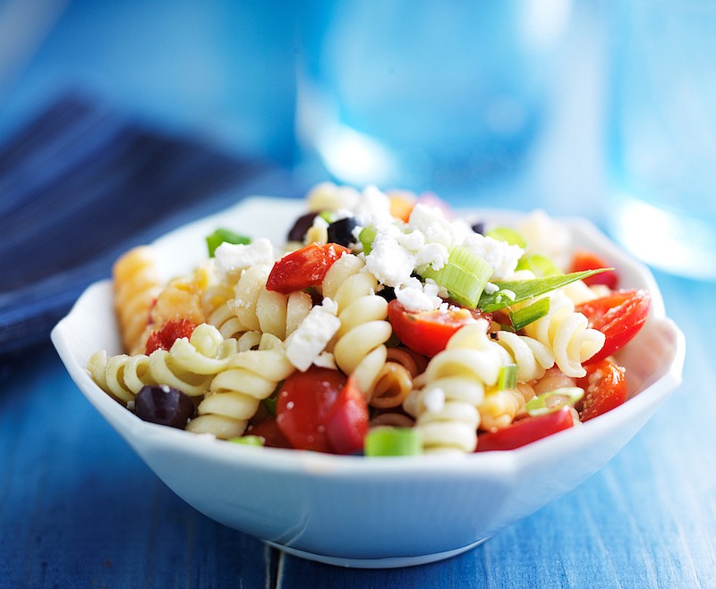 Pasta salad with olives and feta cheese. / Photo credit: Getty Images/iStock/rez-art
