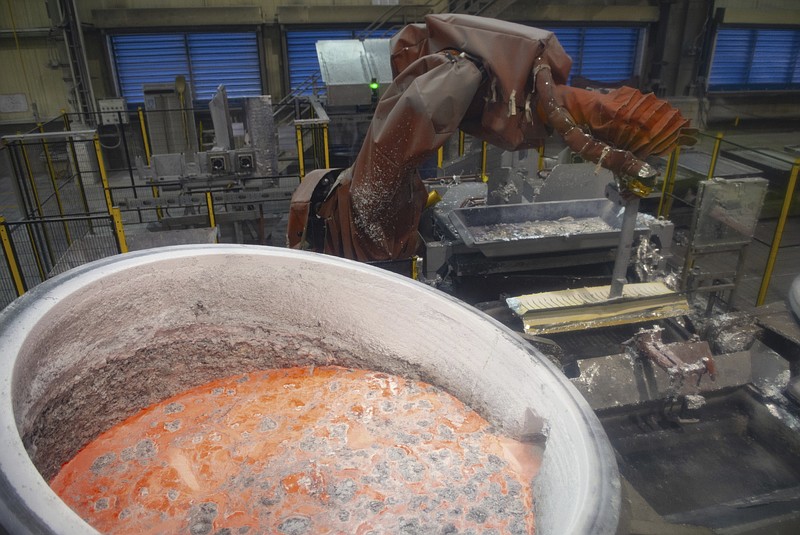 Molten aluminum is seen inside a smelter at the Alouette aluminum plant in Sept-Iles, Quebec, on May 21, 2019. The Trump administration said Tuesday, Spet. 15, 2020, it is dropping taxes on Canadian aluminum, easing tensions with a close ally and preempting Canada's plans to impose retaliatory sanctions. (Jacques Boissinot/The Canadian Press via AP)