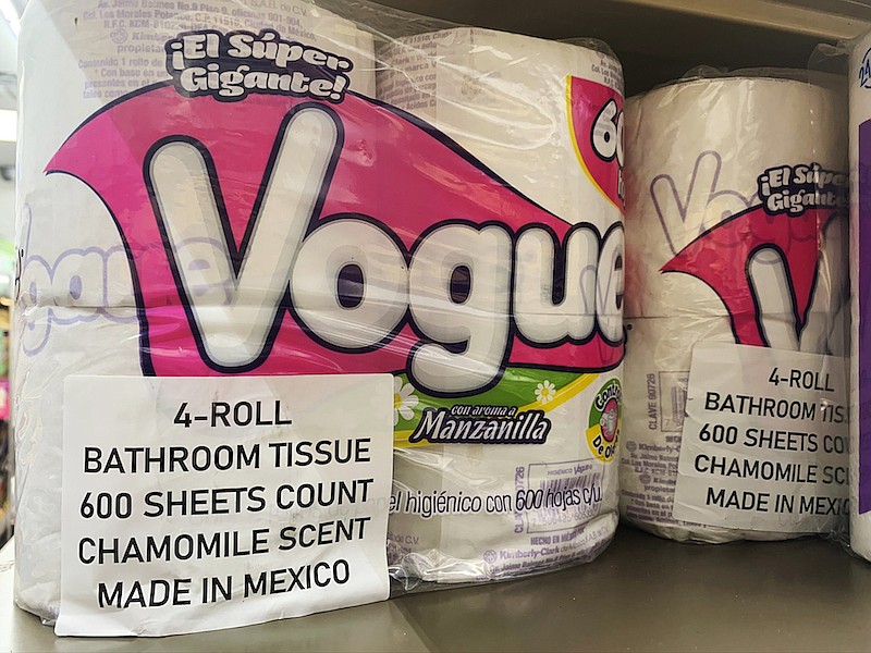 This Sept. 8, 2020, photo, shows Vogue, a Mexican toilet paper brand, on the shelf at a 7-Eleven in New York. Demand for toilet paper has been so high during the pandemic that in order to keep their shelves stocked, retailers across the country are buying up foreign toilet paper brands, mostly from Mexico. (AP Photo/Joseph Pisani)