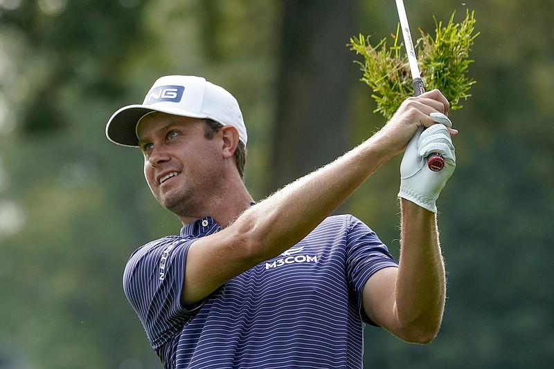 AP photo by Charles Krupa / A divot sails behind former Baylor School standout Harris English as he hits a shot on the 12th fairway of the West Course at Winged Foot Golf Club during the first round of the U.S. Open on Thursday in Mamaroneck, N.Y. English shot a 68 and was tied for eighth, three shots behind leader Justin Thomas.