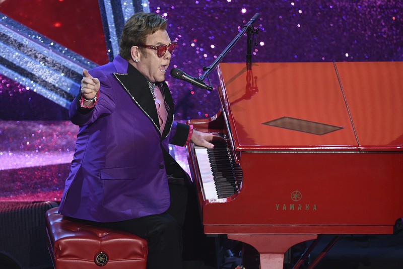 In this Feb. 9, 2020, file photo, Elton John performs "(I'm Gonna) Love Me Again," nominated for the award for best original song, from "Rocketman" at the Oscars in Los Angeles. 