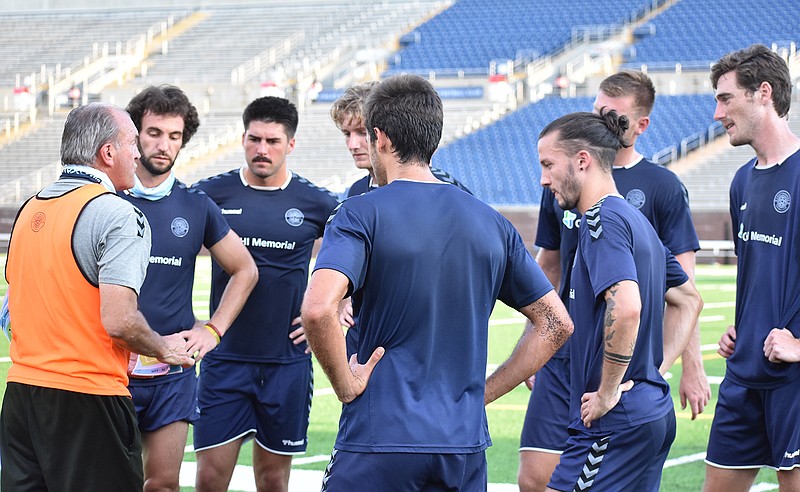 Staff file photo by Patrick MacCoon / Peter Fuller, left, has led the Chattanooga Football Club to six victories in eight matches this year, his first as the team's head coach. CFC will play at least five more matches this year, including two exhibitions in October at Finley Stadium.