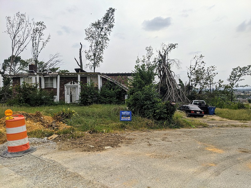 A home in the Holly Hills subdivision shows how little progress has been made five months after the Easter 2020 tornado. Many residents are struggling to get insurance assistance and recovery aide to repair damaged or destroyed homes. / Staff photo by Sarah Grace Taylor