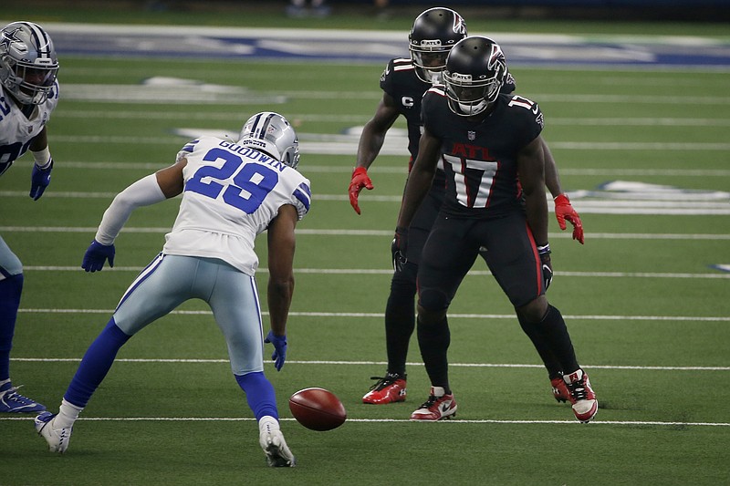 AP photo by Ron Jenkins / Dallas Cowboys cornerback C.J. Goodwin (29) tracks his team's onside kick as the Atlanta Falcons' Olamide Zaccheaus (17) looks on near the end of Sunday's game in Arlington, Texas. Goodwin recovered the onside kick by Greg Zuerlein, who soon after made a 46-yard field goal as time expired for a 40-39 victory.