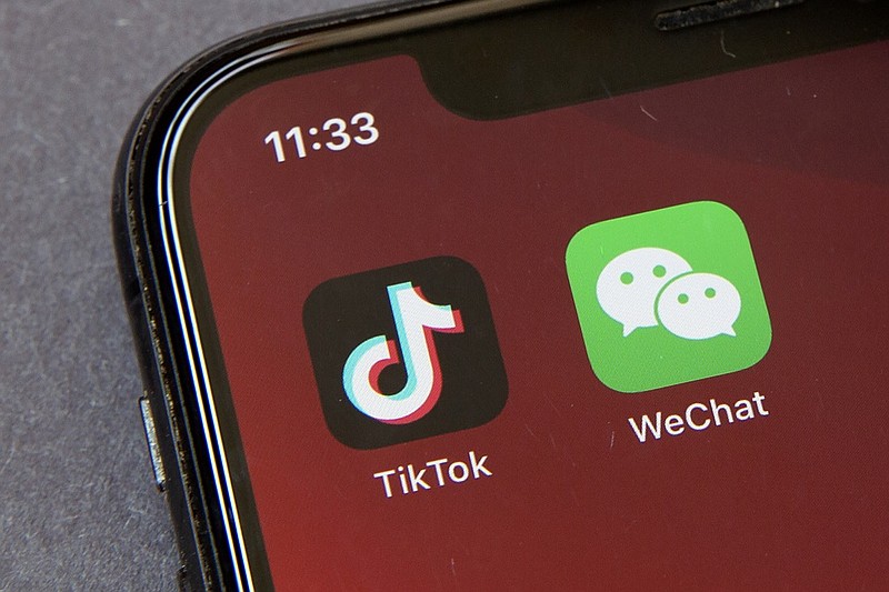 FILE - A federal judge has approved a request from a group of WeChat users to delay looming U.S. government restrictions that could effectively make the popular app nearly impossible to use. In a ruling dated Saturday, Sept. 19, 2020, Magistrate Judge Laurel Beeler in California said the government's actions would affect users' First Amendment rights as an effective ban on the app removes their platform for communication. (AP Photo/Mark Schiefelbein, File)