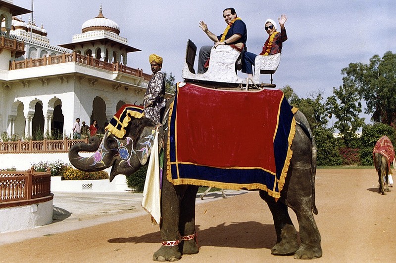 This image provided by the Supreme Court shows Supreme Court Justice Ruth Bader Ginsburg and Supreme Court Justice Antonin Scalia as they ride an elephant in Rajasthan, India, in 1994 . Ruth Bader Ginsburg died at her home in Washington, on Sept. 18, 2020, the Supreme Court announced. (Collection of the Supreme Court of the United States via AP)