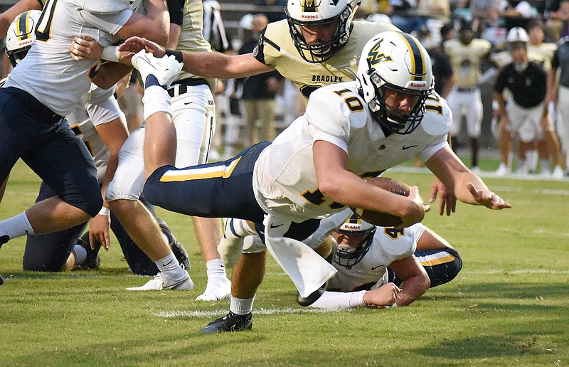 Walker Valley's Tucker Pope dives into the end zone for a touchdown against Bradley Central on Aug. 27. Pope accounted for six touchdowns in a 49-14 victory over White County on Friday night.