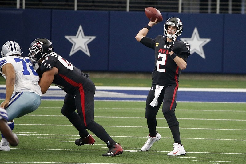 Dallas Cowboys defensive tackle Trysten Hill (72) rushes as Atlanta Falcons offensive guard Christian Lindstrom (63) defends allowing quarterback Matt Ryan (2) to throw a pass in the first half of an NFL football game in Arlington, Texas, Sunday, Sept. 20, 2020. (AP Photo/Ron Jenkins)