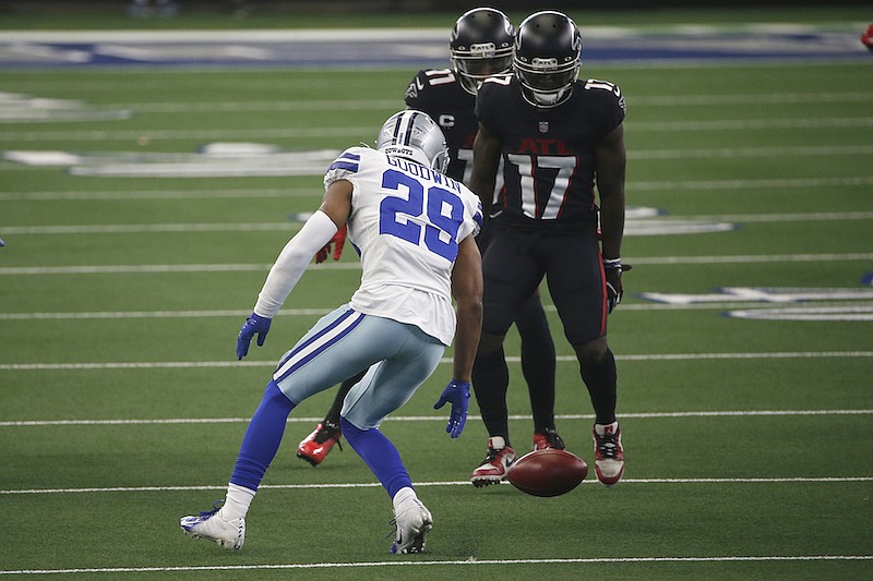 Dallas Cowboys cornerback C.J. Goodwin (29) and Atlanta Falcons wide receiver Olamide Zaccheaus (17) watch an onside kick during an NFL football game in Arlington, Texas, Sunday, Sept. 20, 2020. (AP Photo/Ron Jenkins)