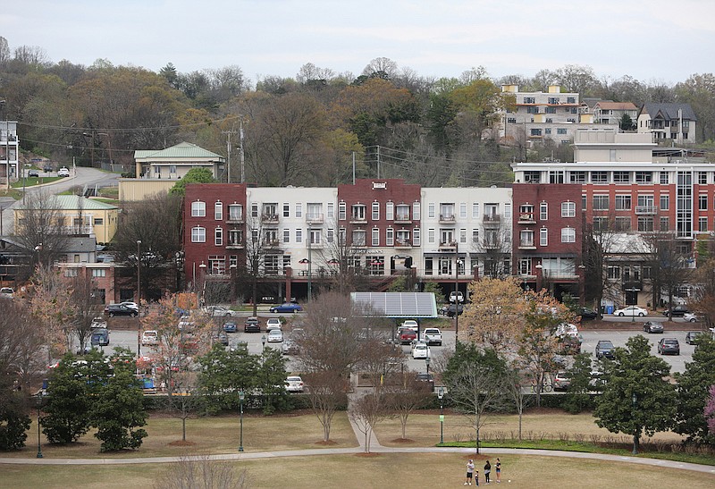 Coolidge Park, North Shore businesses and residential housing can be seen from Walnut Street Bridge Wednesday, March 28, 2018, in Chattanooga, Tenn. The North Shore area of town is popular for local residents as well as visitors from out of town. / Staff file photo