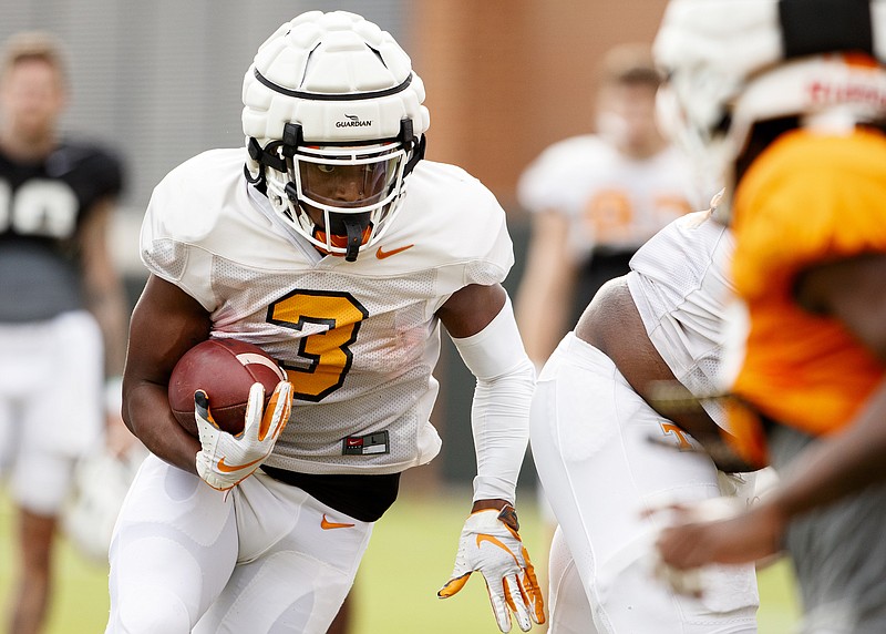 Tennessee Athletics photo by Caleb Jones / Tennessee sophomore running back Eric Gray looks for room to roam during Tuesday's practice on Haslam Field.