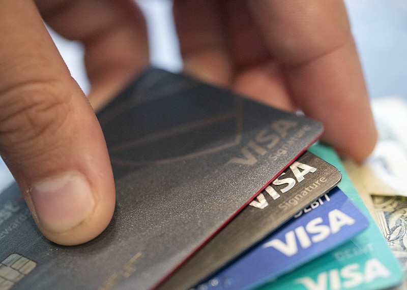 FILE - This Aug. 11, 2019 file photo shows Visa credit cards in New Orleans. If you've been denied COVID-19 assistance for your credit cards or offered terms that are not sustainable, credit counseling may get your finances on track. (AP Photo/Jenny Kane, File)