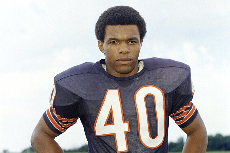 AP photo / Chicago Bears running back Gale Sayers poses in 1970. Sayers, a member of the college and pro football halls of fame, died Wednesday.