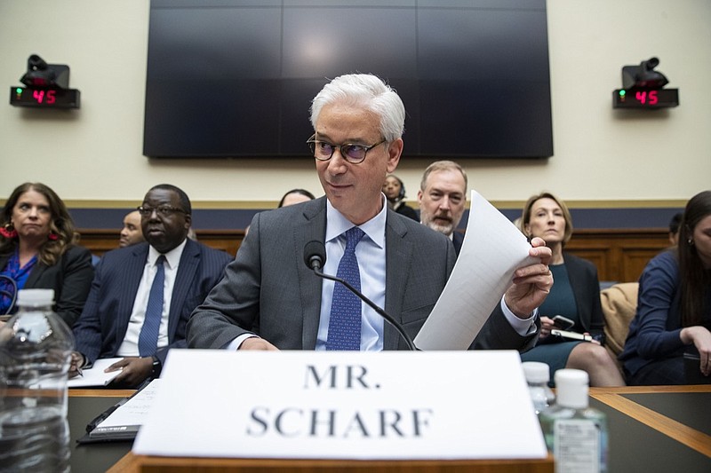 FILE - In this March 10, 2020 file photo, Wells Fargo CEO and President Charles Scharf is seated before he testifies during a hearing of the House Financial Services Committee, on Capitol Hill, in Washington. Scharf apologized Wednesday, Sept. 23 for comments he made that dismissed concerns that the banking industry, which has a long history of racist behavior, wasn't doing enough to promote and retain diverse talent. (AP Photo/Alex Brandon, File)