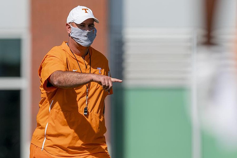 Tennessee Athletics photo / Tennessee football coach Jeremy Pruitt provides instruction during a recent practice on Haslam Field.