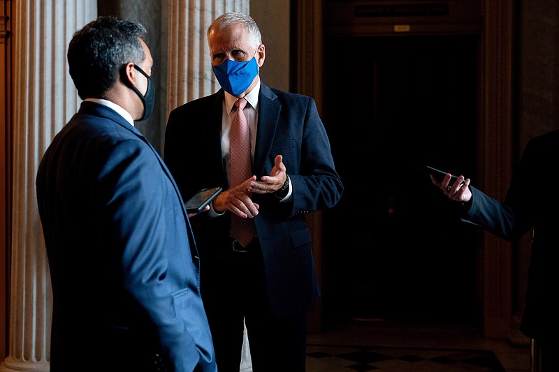 Photo by Anna Moneymaker of The New York Times / Sen. Thom Tillis, R-North Carolina, gestures while speaking to reporters at the Capitol in Washington on Thursday, Sept. 17, 2020.