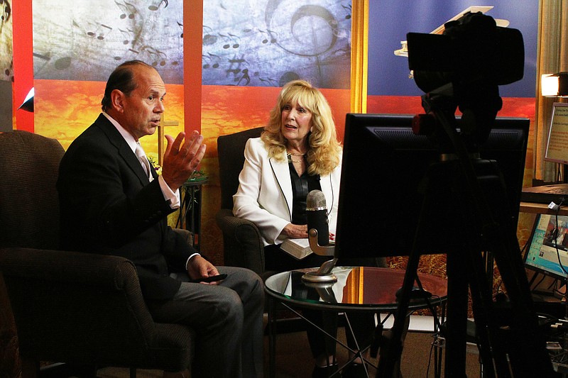 Staff photo by Wyatt Massey / Wayne Estrada and Jeanne Sheffield Estrada record their weekly "Notes on Life" TV show in their North Chattanooga studio on Sept. 24, 2020.