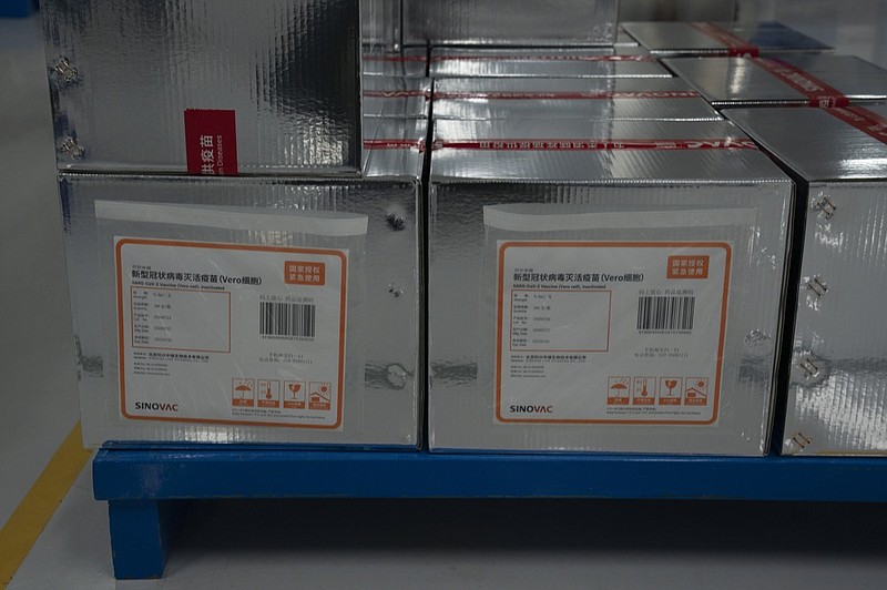 Boxes of SARS CoV-2 Vaccine for COVID-19 stamped with the words "State Authorized, Emergency Use" produced by SinoVac are stacked at its factory in Beijing on Thursday, Sept. 24, 2020. Under an emergency use regulation, hundreds of thousands of people in China have been given Chinese vaccines, before final regulatory approval for general use. It's a highly unusual move that raises ethical and safety questions, as companies and governments worldwide race to develop a vaccine that will stop the spread of the new coronavirus. (AP Photo/Ng Han Guan)


