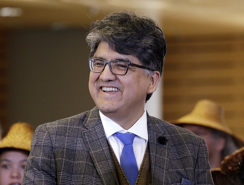 FILE - In this Oct. 10, 2016 file photo, author and filmmaker Sherman Alexie appears at a celebration of Indigenous Peoples' Day at Seattle's City Hall. Alexie is included in a list of authors who wrote books that were among the 100 most subjected to censorship efforts over the past decade, as compiled by the American Library Association. Alexie's prize-winning "The Absolutely True Diary of a Part-Time Indian" came in at No. 1. (AP Photo/Elaine Thompson, File)