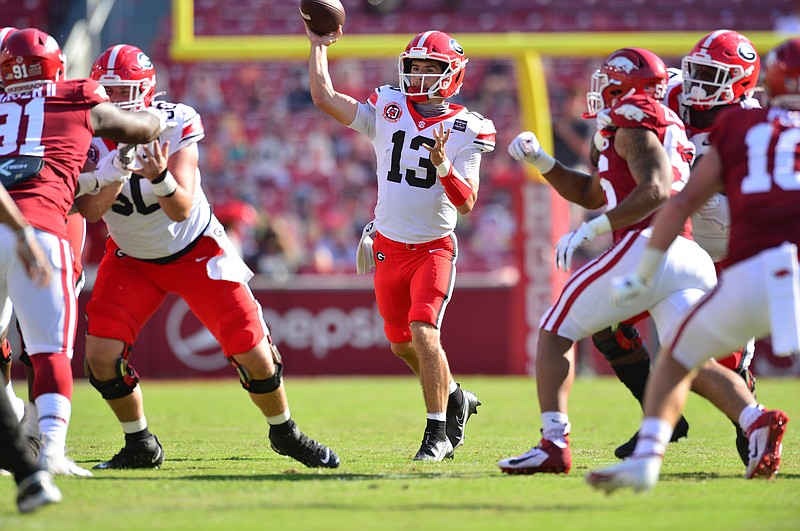 Georgia redshirt junior quarterback Stetson Bennett rallied the Bulldogs from a second-quarter deficit to a 37-10 win at Arkansas during last Saturday's season opener. (Georgia photo by Walt Beazley)