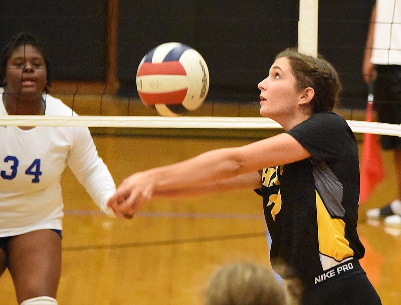 Staff photo by Matt Hamilton / Hixson's Riley Bellamy bumps the ball during Tuesday's home match against Red Bank.